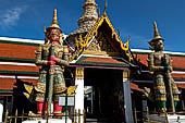 Bangkok Grand Palace, pair of giant yakshas statues the gatekeepers of the entrance of the eastern gallery. Temple of the Emerald Buddha (Wat Phra Kaew). 